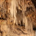 Stalagtites dripping from the ceiling of the Crystal Cave