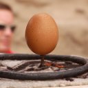 Balancing egg on Nail
