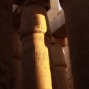 Under the roof supported by the massive stone columns, Karnak