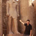 Dave in front of statue, Temle at Luxor
