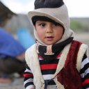 Nomadic boy - only way to stop him from crying was to take his photo ... again and again