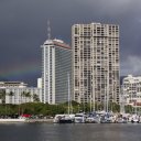 Rainbow photo of Honolulu buildings