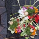 One-of-the-obligatory-flowers-put-in-front-of-every-shop-and-home-location-Ubud-Bali