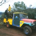 These young men are cutting some firewood and taking it to their village in the back of one very colorful Landcruiser