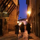 Narrow cobblestone street at night in Ohrid