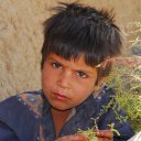 I am regarded with suspicion by this boy, whom I ran into in northern Afghanistan