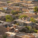 A peek into the back yards and regular homes from a high minaret tower