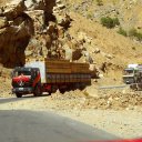 Lumber that was likely harvested in the deep valleys of Northern Afghanistan\'s Hindukush Mountains being trucked into Kabul