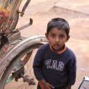 Child, poor neighborhood within Dhaka