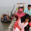 Getting off wood boat in the Sundarbans, South Bangladesh
