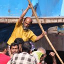 Man rowing boat, Buriganga River - Dhaka