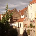 Sunsetting on colorful buildings in Bruges