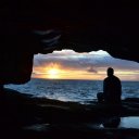Sea cave at sunset