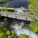 A-footbridge-connecting-little-islands-created-by-streams-that-braid-themselves