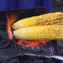 Corn-roasting-over-coals-sidewalk-vendor-Bali