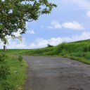Nature-surrounded-road-among-rice-terraces-Eastern-Bali