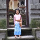 Girl-at-entrance-to-her-family39s-home-Ubud-Bali