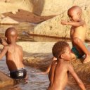Kids playing in the river