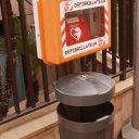 There are defribrallators above the garbage cans on the streets!