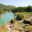 Water cascades from one limestone pool into another after the southern mountains got drenched during the preceeding monsoon
