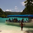 Docking the boat in a secluded bay, rock islands