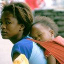 Young mother and sleeping child...a lovely sight anywhere in the world