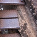 Metal steps leading up the sheer walls of the Rock Temple - Sigiriya