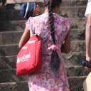 Woman carrying Baby - Sri Lanka