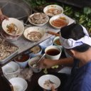 Man-cooking-soup-at-Bangkoks-Talin-Chan-Floating-Market