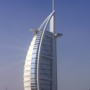 The world's first and so far only seven star hotel sits on a small artificial island in the Persian Gulf and is accessible via a bridge. Of course, the rich and famous fly in by helicopter on the circular landing pad that cantilevers out near the top.