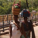 Women crossing the Victoria Falls Bridge