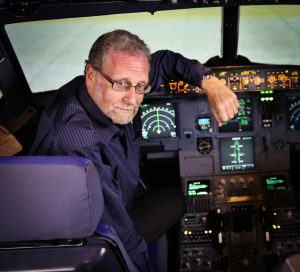 Peter Greenberg in the flight simulator at Etihad Academy - Photo credit: Courtney Crockett