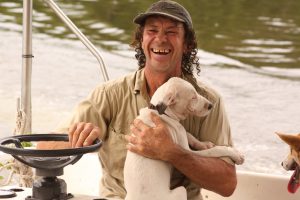 Our happy and knowledgeable guide on the Daintree River. This is his "office"!