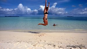Author jumping for joy in the midst of another of Palau's spectacular postcard views!