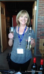 "Happy with a glass of Gaspereau Tidal Bay at a reception in Halifax"