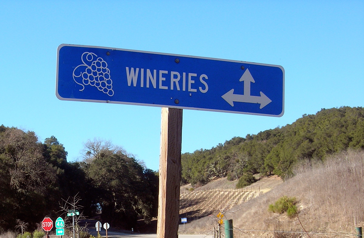 a sign at the junction of Vineyard Drive and Highway 46 west