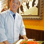 Executive Chef, Yukio Sonoda proudly serving a delicious crab dish. 