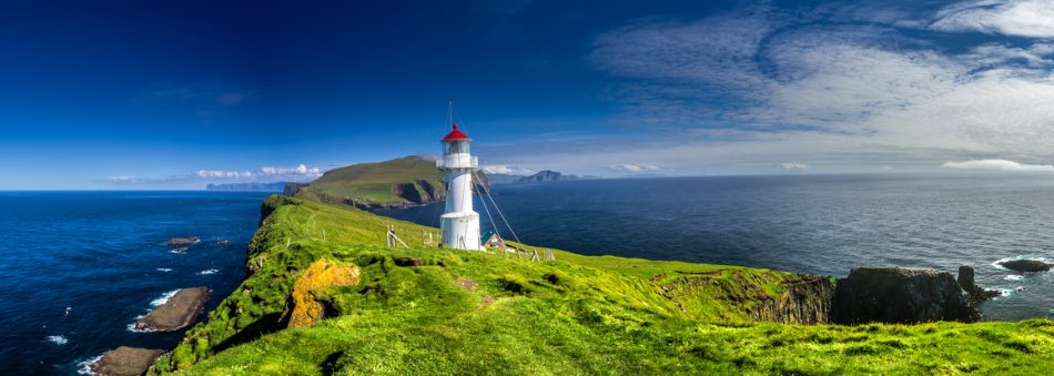 Panoramic view of Old lighthouse on the beautiful island Mykines.