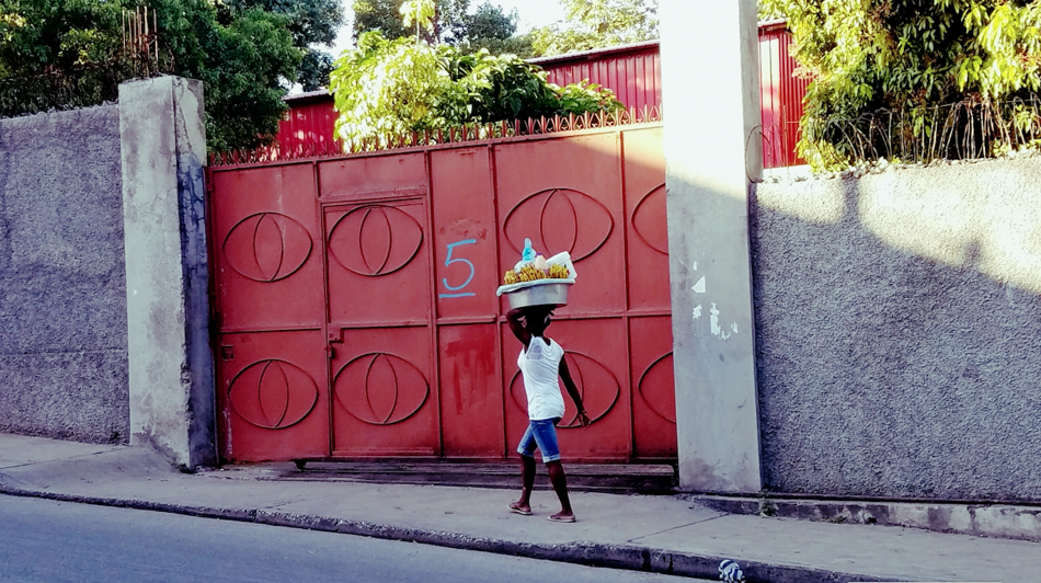 Merchants selling fruit. The day begins early on the streets of Port au Prince