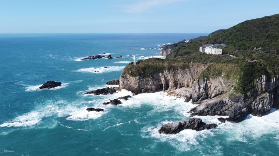 Aerial view of Cape Ashizuri's dramatic sea cliffs and lighthouse on Shikoku's southern coast, Kochi, Japan