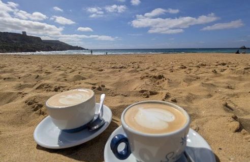 Coffee on the beach in golden bay, Malta