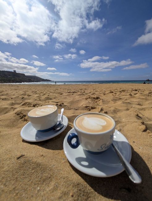 Coffee on the beach in golden bay, Malta