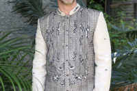 Man wearing a custom Barong Tagalog with black embroidery