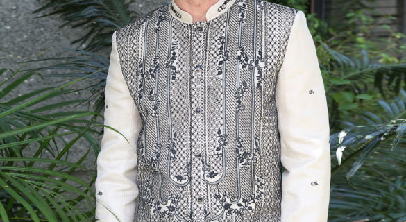 Man wearing a custom Barong Tagalog with black embroidery