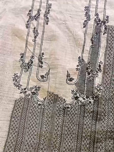 Calado ornament in progress on Barong Tagalog fabric