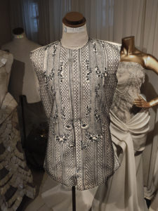 Custom Barong Tagalog displayed in the workshop