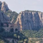 The Santa Cova chapel of Montserrat set against the rock cliffs, seen from the Camí de la Santa Cova