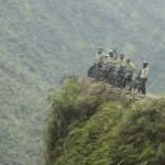 Death Road Group at edge of cliff