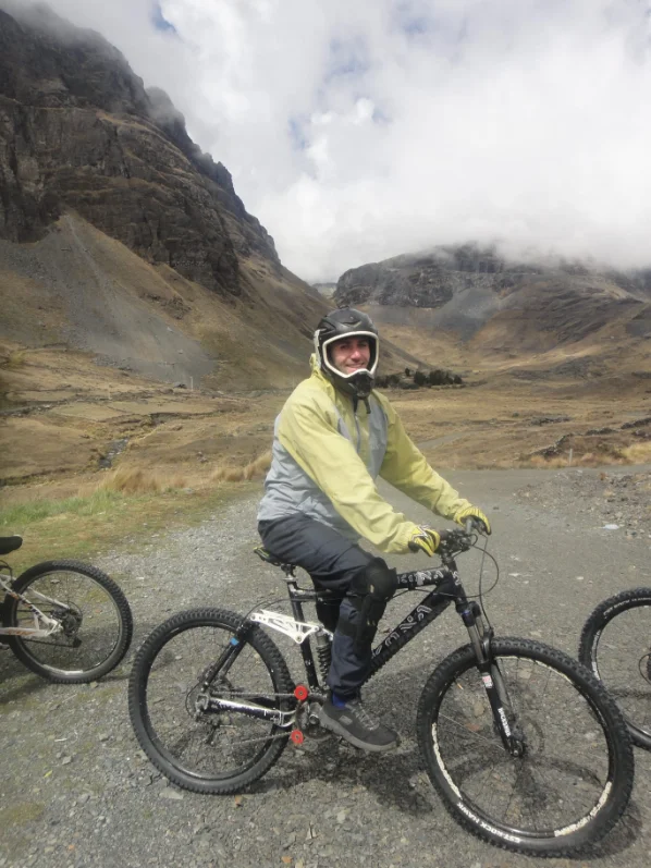 Happy man on bike on famous death road