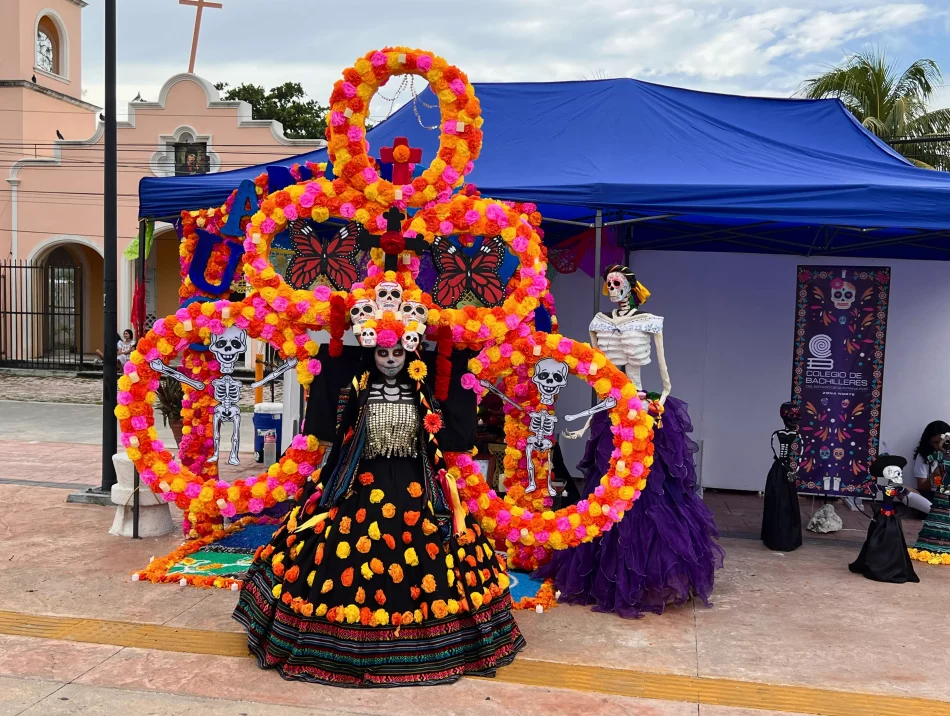 Woman in a Catrina-style costume posing at the Hanal Pixán/Day of the Dead festival in Puerto Juárez, Cancún.